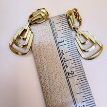 Load image into Gallery viewer, 80s Trifari Textured Gold-Tone Tiered Geometric Dangle Clip-On Earrings