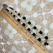 Load image into Gallery viewer, Vintage 1960s Black Cream Faux Pearl Glass Bead Necklace Silver Flower Box Clasp