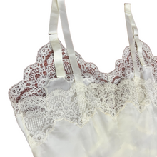 Load image into Gallery viewer, Vintage Full Dress Slip Size 32. Features lace trim, and adjustable straps. Made in the USA. 100% nylon.