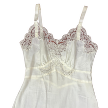 Load image into Gallery viewer, Vintage Full Dress Slip Size 32. Features lace trim, and adjustable straps. Made in the USA. 100% nylon.