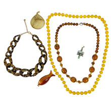 Load image into Gallery viewer, Chunky Boho Jewelry. This curated lot of jewelry includes 2 vintage beaded necklaces, 1 contemporary faux tortoiseshell necklace, one amber colored fish pendant, one teardrop shaped pendant and one shell inlay pendant with crystal or glass stones.