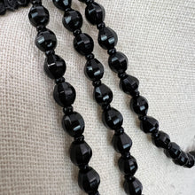 Load image into Gallery viewer, This Victorian Antique Jet Black Faceted Bead Mourning Necklace boasts an extra-long length, perfectly suited to those with a fashionable eye and appreciation for unique jewelry. This necklace can be worn in various. Alone or layered, it makes a statement.