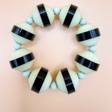 Load image into Gallery viewer, Mid-Century Mod Black &amp;Cream Saucer Bead Stretch Bracelet
