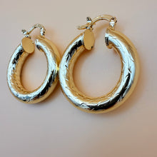 Load image into Gallery viewer, 80s Gold Tone Diamond Cut Thick Tube Hoop Earrings Chevron Etched
