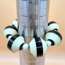 Load image into Gallery viewer, Mid-Century Mod Black &amp;Cream Saucer Bead Stretch Bracelet
