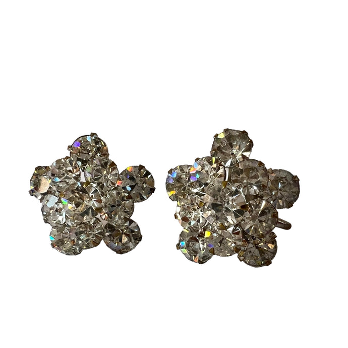 Vintage Rhinestone Screw Back Earrings. Silver tone metal. Base metal silver. Unmarked. In the style of Eisenberg Ice. Star shaped clear rhinestone earrings.   Excellent vintage condition the screw back works properly. The rhinestones are clear, shiny and bright!  Processed within 1 business day (not included in shipping carrier’s estimated arrival time). Tracking uploaded immediately upon shipment.