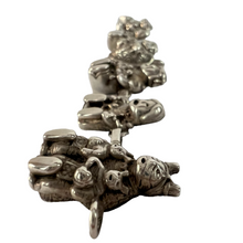 Load image into Gallery viewer, Navajo Storyteller Sterling Silver Bracelet.  This impressive vintage Native American bracelet features eight intricate hand-carved sterling silver storytellers. Each marked Sterling with the Navajo artist Carol Felley maker&#39;s mark. Era: 1970s or5 earlier. Vintage Native American storyteller charm bracelet. Weight: 46 grams.
